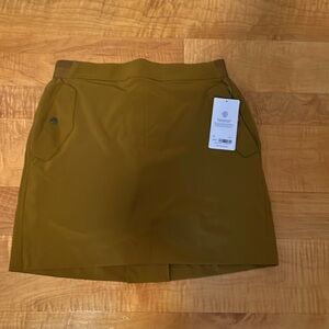 NWT Athleta Vienna Cargo Skort. Size 12 has pockets, pull on. Cinnamon color